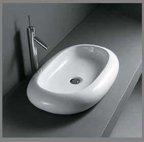 Model: 9012 Oval porcelænshåndvask til montering på bord. Uden overløb.  660x420x110